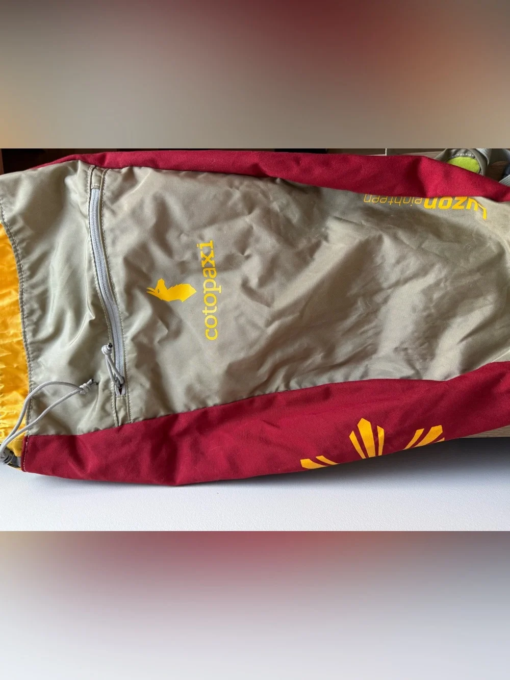 cotopaxi Maroon and Yellow Logo Daypack